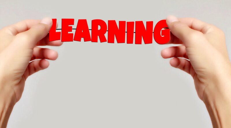 Learning concept with hands holding letters